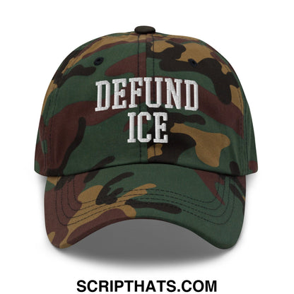 A camouflage unstructured dad hat with defund ice embroidered in white lettering on the front