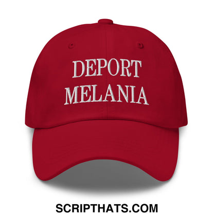 A red unstructured dad hat featuring white embroidered text reading deport melania on the front panel