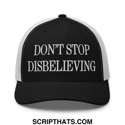 Black and white mesh trucker hat with embroidered dont stop disbelieving text in bold uppercase font