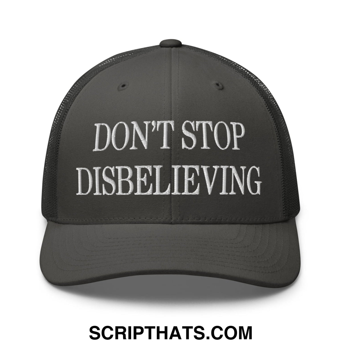 A dark gray mesh trucker hat with white embroidered text reading dont stop disbelieving on the front