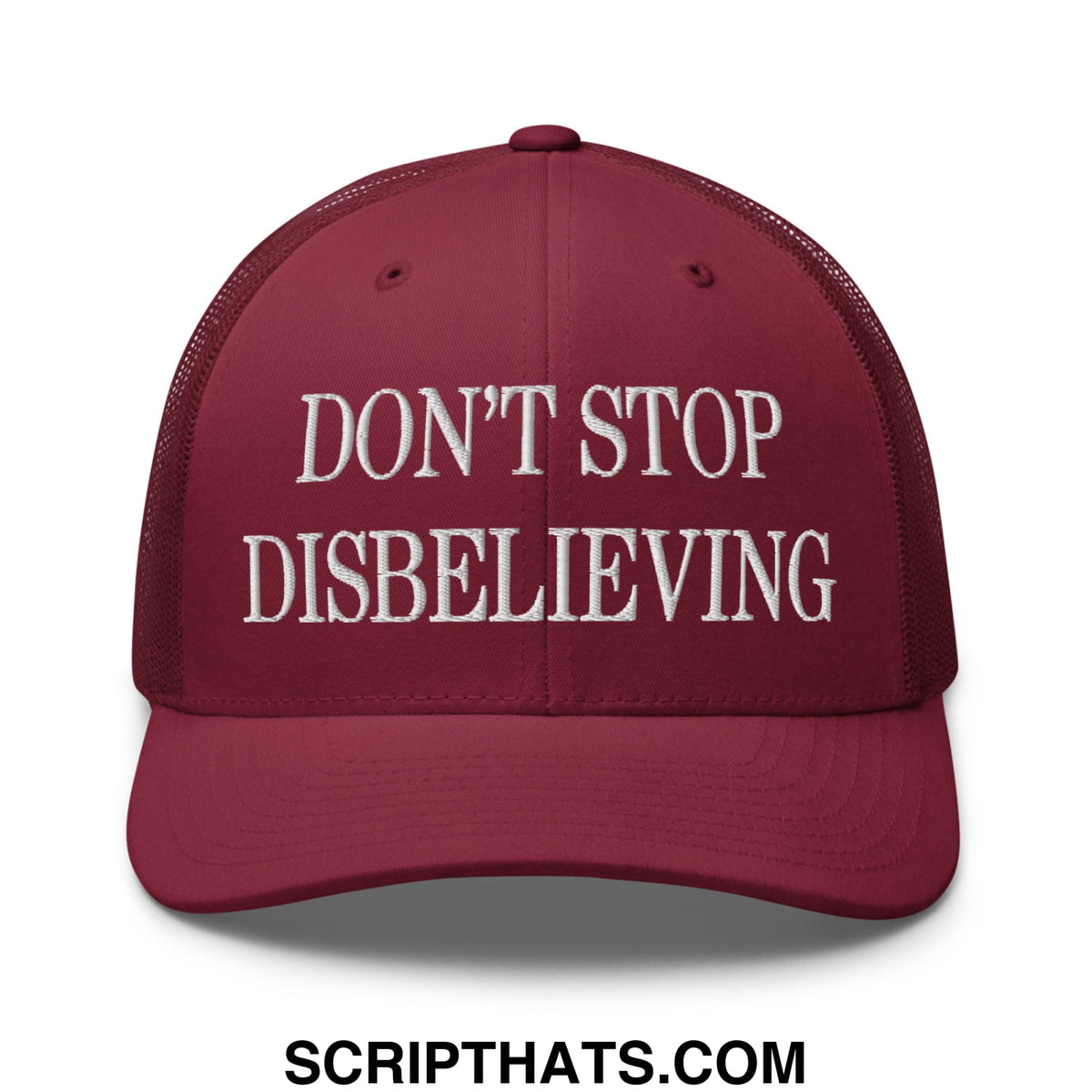 Maroon mesh trucker hat with white embroidered text reading dont stop disbelieving for casual wear
