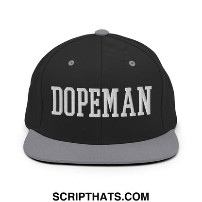 Black snapback hat with gray flat bill brim and bold white embroidered dopeman lettering on front panel