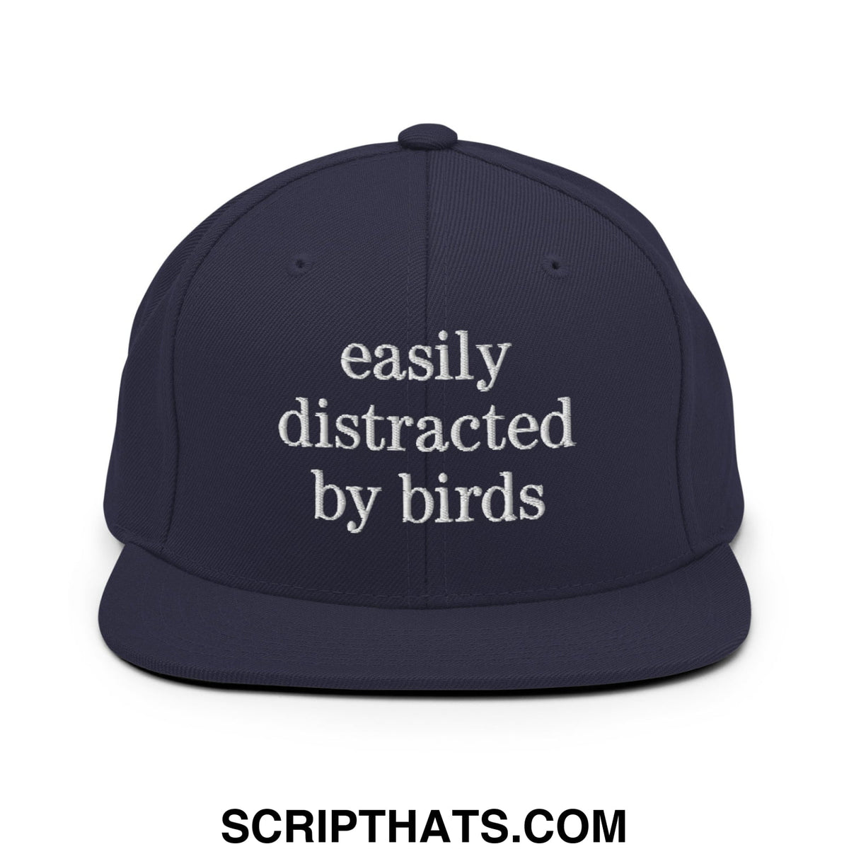 Navy blue snapback hat with white embroidered easily distracted by birds text and flat bill brim design