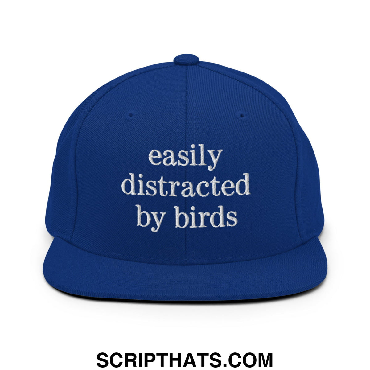 Royal blue snapback hat with white embroidered easily distracted by birds text and flat bill brim design