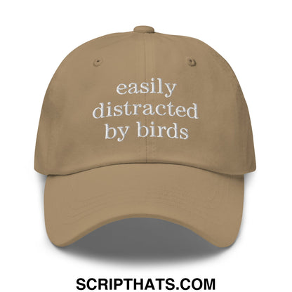 Tan unstructured dad hat with white embroidered easily distracted by birds text on front panel