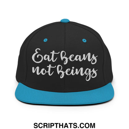 Black snapback hat with teal brim and silver embroidered eat beans not beings text flat bill brim design