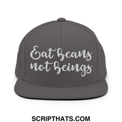 A dark gray snapback hat with white embroidered eat beans not beings script and a flat bill brim