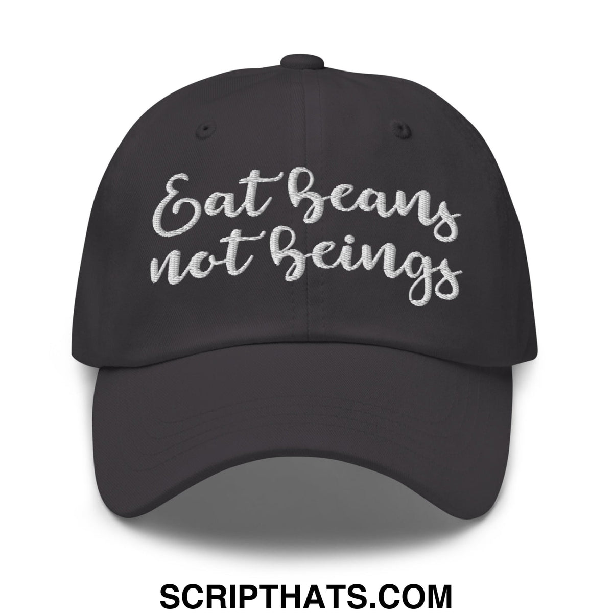 Black unstructured dad hat with white embroidered script reading eat beans not beings, vegan statement cap