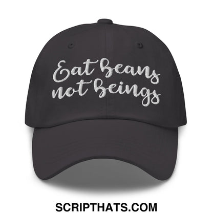 Black unstructured dad hat with white embroidered script reading eat beans not beings, vegan statement cap