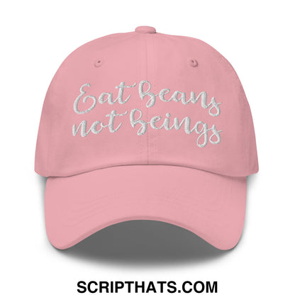 Pink unstructured dad hat featuring silver embroidered text eat beans not beings for casual wear