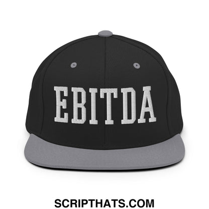Black snapback hat with gray flat bill brim and white embroidered EBITDA lettering for casual wear