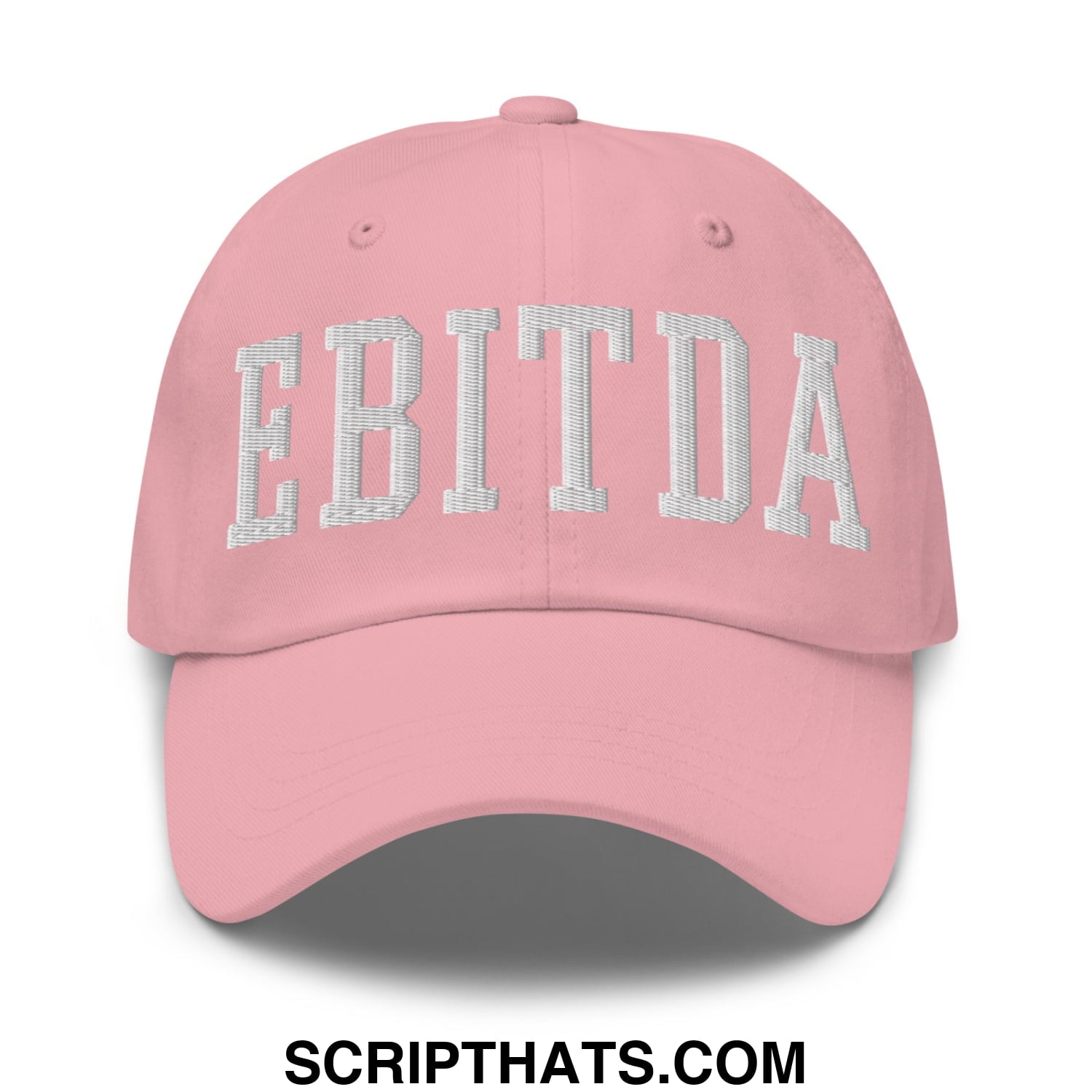 A soft pink unstructured dad hat with ebitda embroidered in white textured arch design