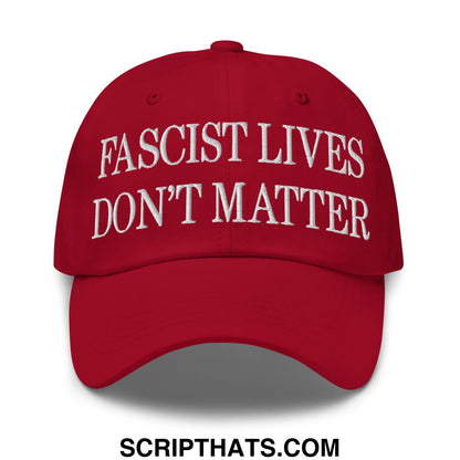 Red unstructured dad hat with white embroidered text reading fascist lives dont matter for casual wear