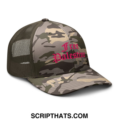 A camouflage mesh trucker hat with pink embroidered free palestine text in ornate script font
