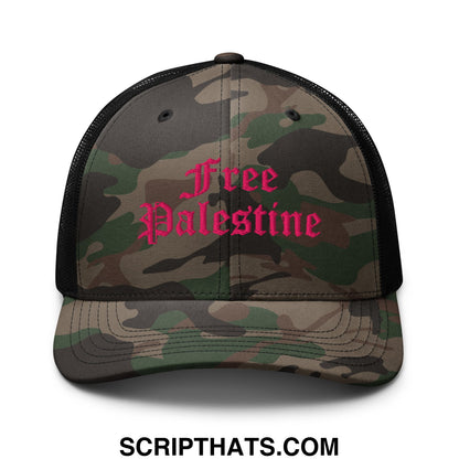 A camouflage mesh trucker hat with black sides and a pink embroidered free palestine logo in gothic script
