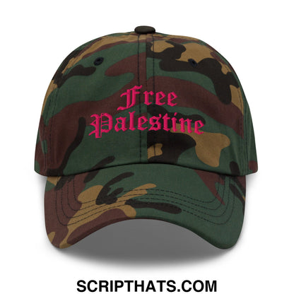 A camouflage unstructured dad hat with free palestine embroidered in pink script across the front