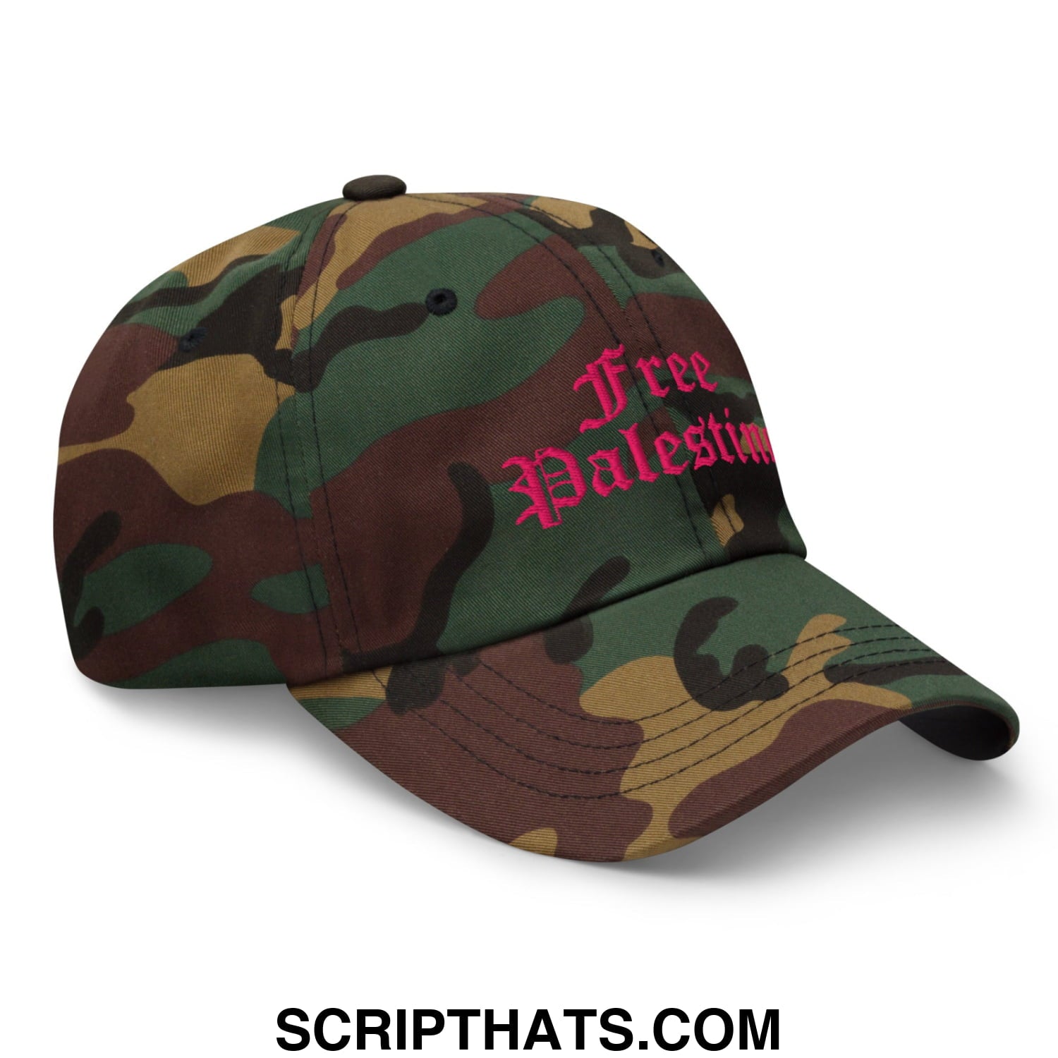 A camouflage baseball cap with free palestine embroidered in pink script in an unstructured dad hat style