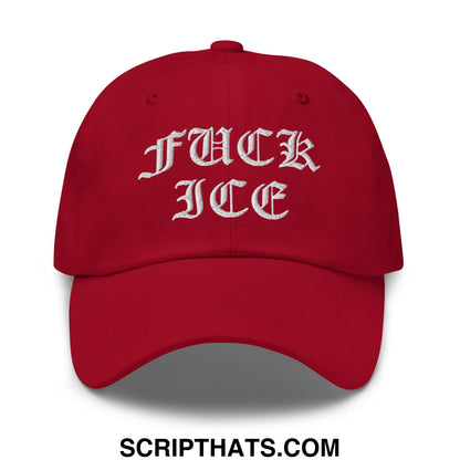 A red unstructured dad hat with white old english embroidered text with fuck ice design