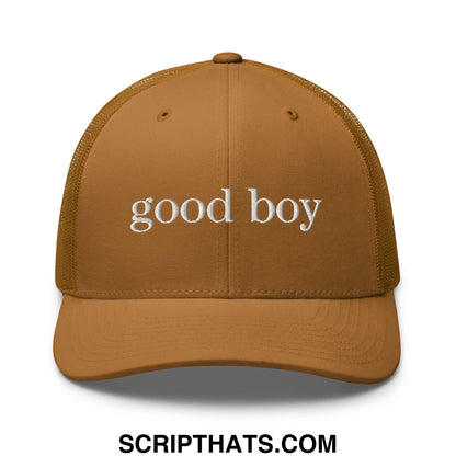 Tan mesh trucker hat with white embroidered good boy text across the front in a casual style design