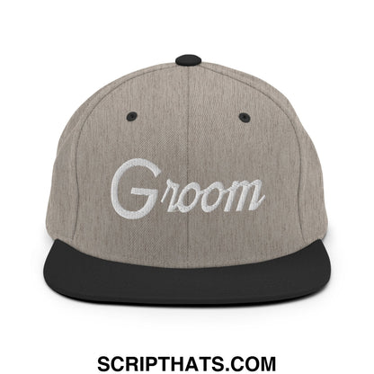Gray and black snapback hat with white embroidered groom script on the front flat bill brim design