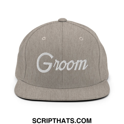 Gray snapback hat with white embroidered groom sports script and a flat bill brim for wedding day use