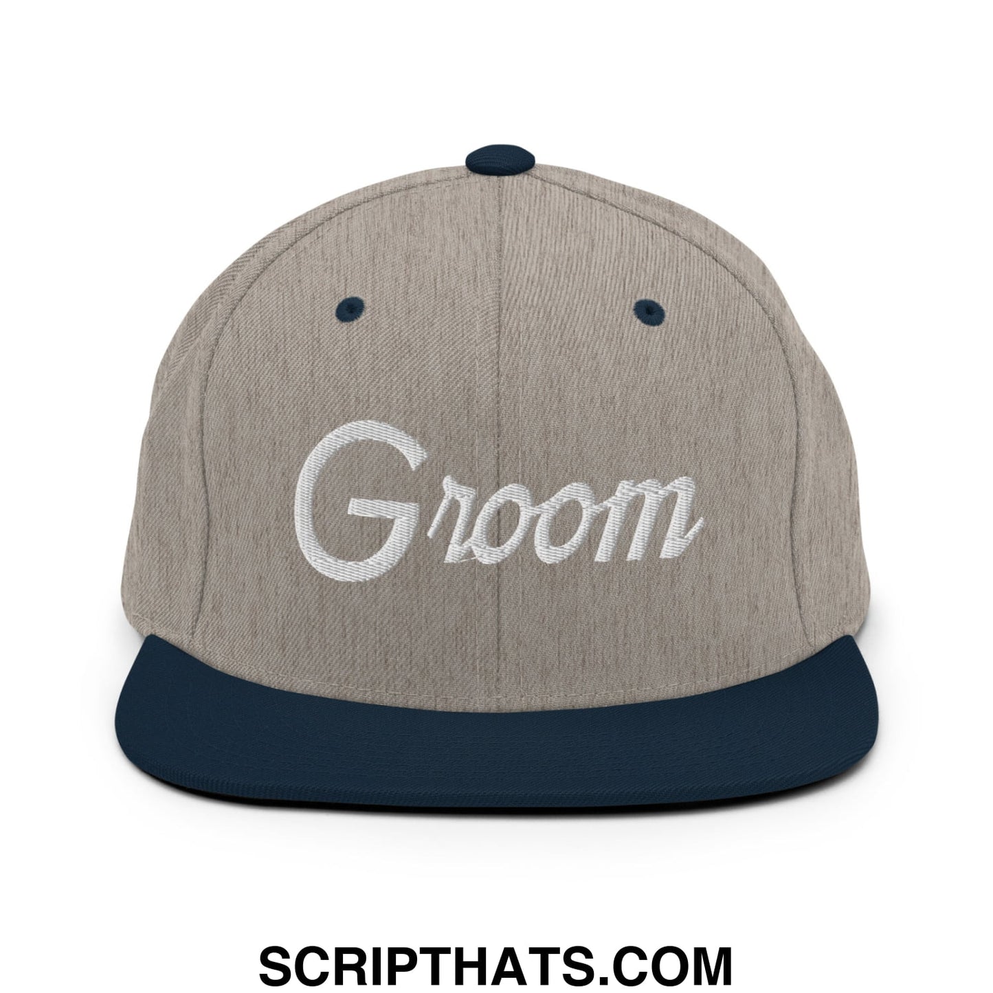A gray and navy blue snapback hat with groom embroidered in white script on the front flat bill brim