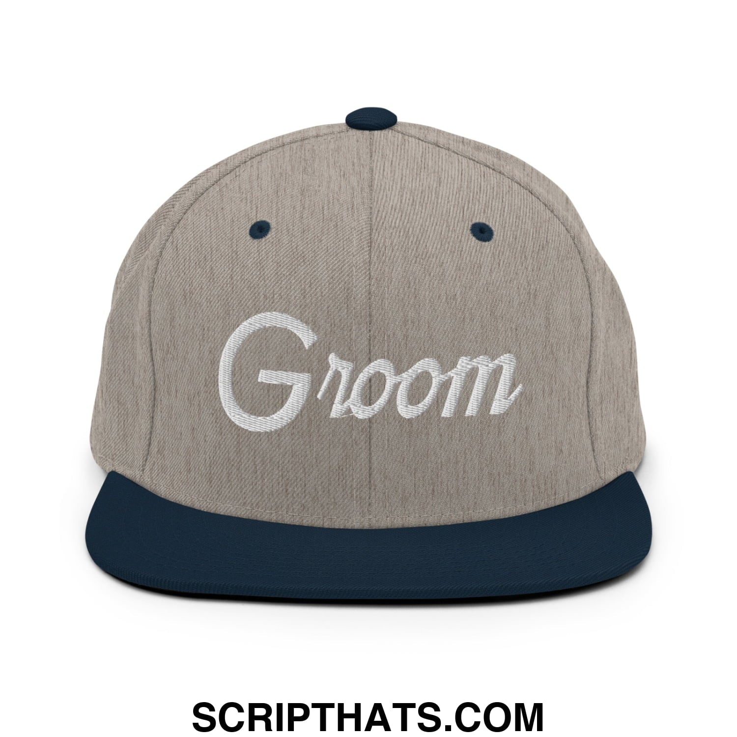 A gray and navy blue snapback hat with groom embroidered in white script on the front flat bill brim