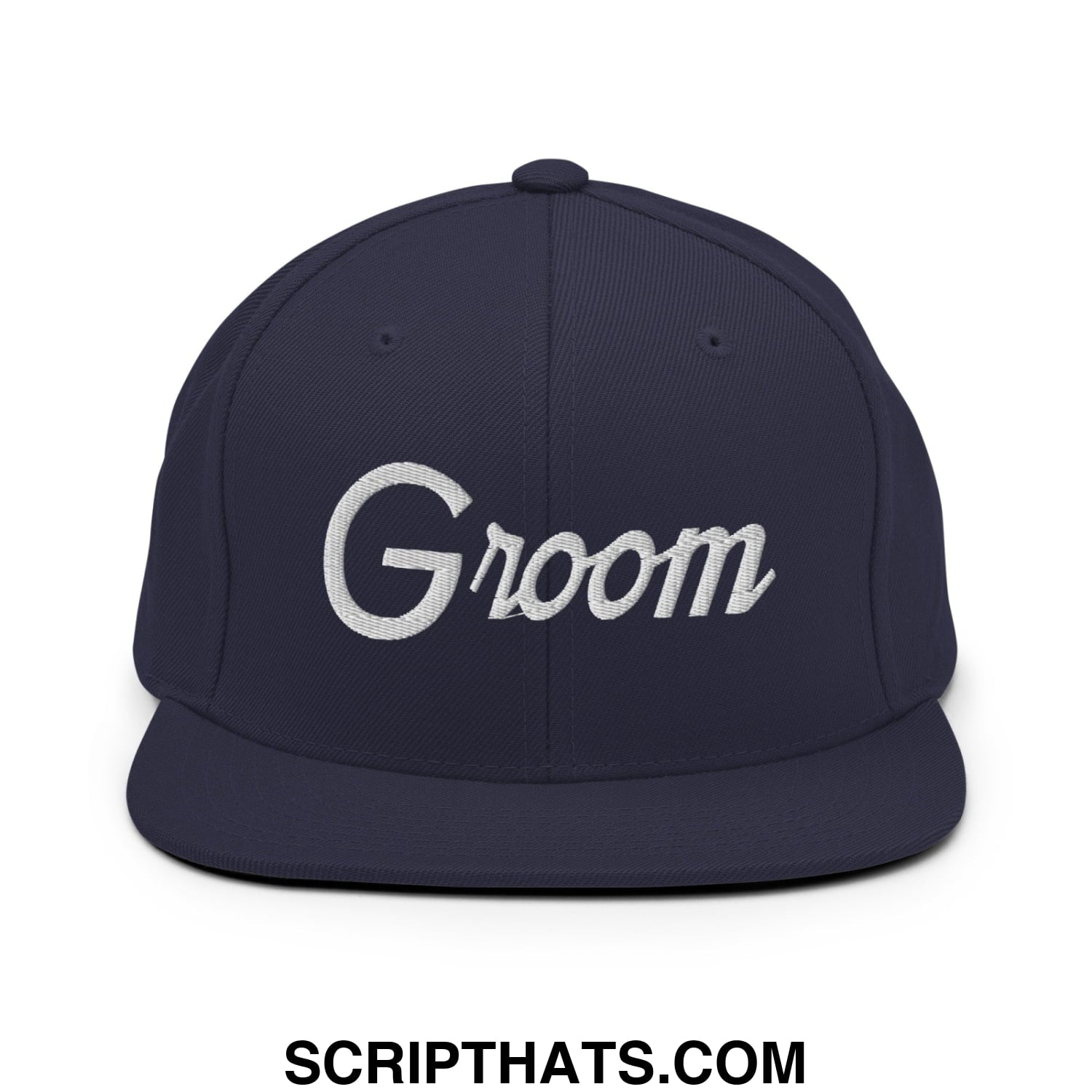 Navy blue snapback cap with white embroidered groom script on the front and flat bill brim for sports use