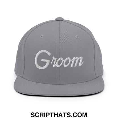 Gray snapback hat with white embroidered groom script on front and flat bill brim for sports and casual wear