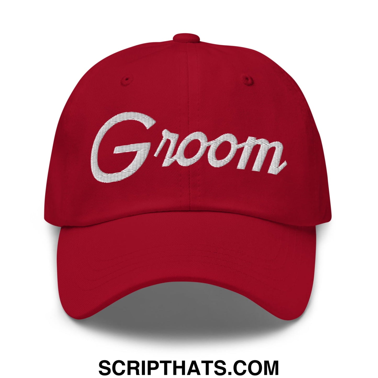 Red unstructured dad hat with white embroidered groom sports script designed for wedding wear