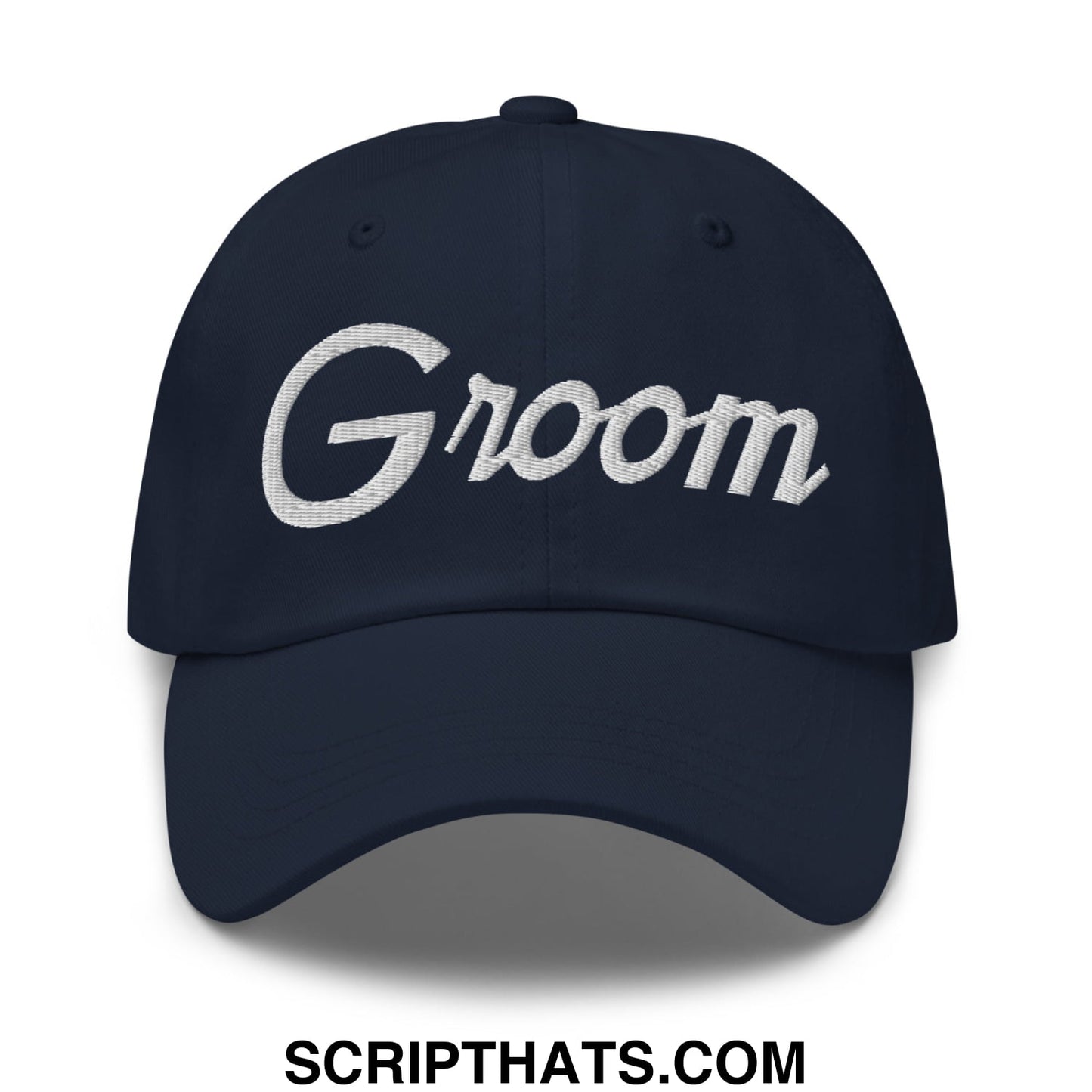 Navy blue unstructured dad hat with white embroidered groom sports script across the front for wedding use