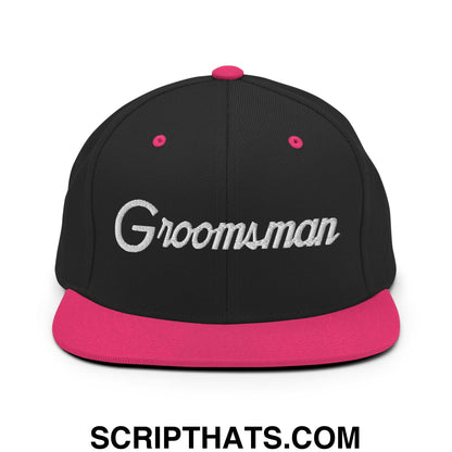 Black snapback hat with vibrant pink brim and silver embroidered groomsman text in sports script style