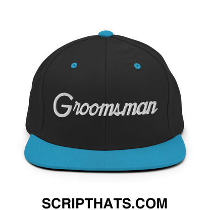 Black snapback cap with teal flat bill and button embroidered with groomsman in silver thread for wedding use