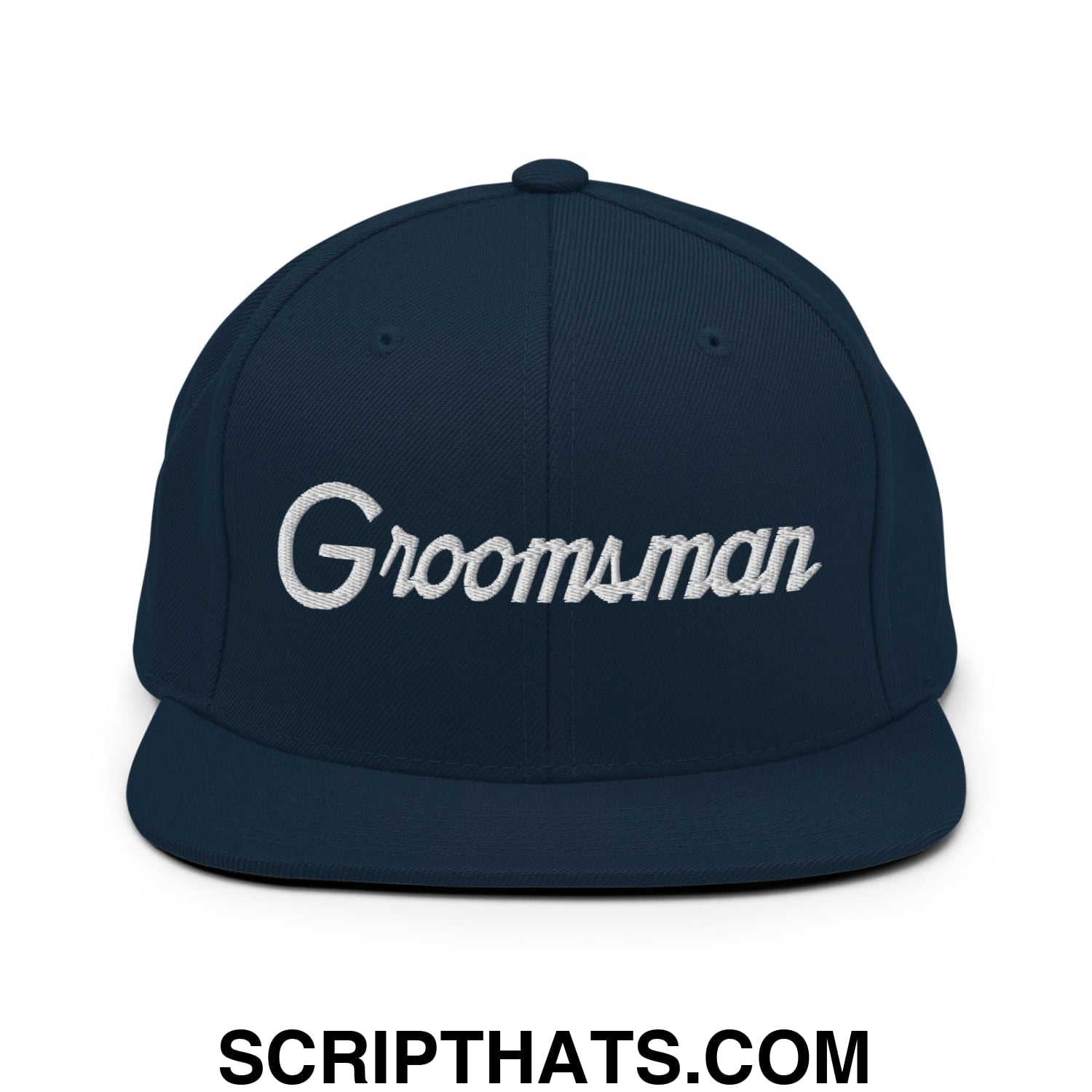 Navy blue snapback hat with white embroidered groomsman script and flat bill brim for wedding party use