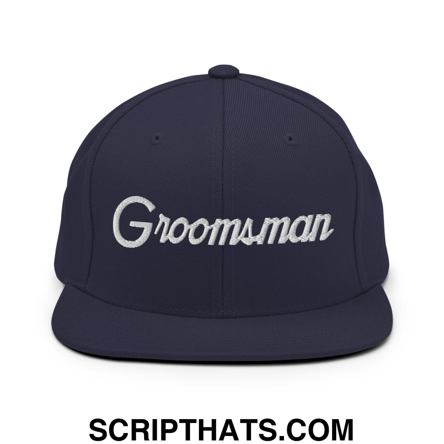 Navy blue snapback hat with white embroidered groomsman script and flat bill brim for wedding use