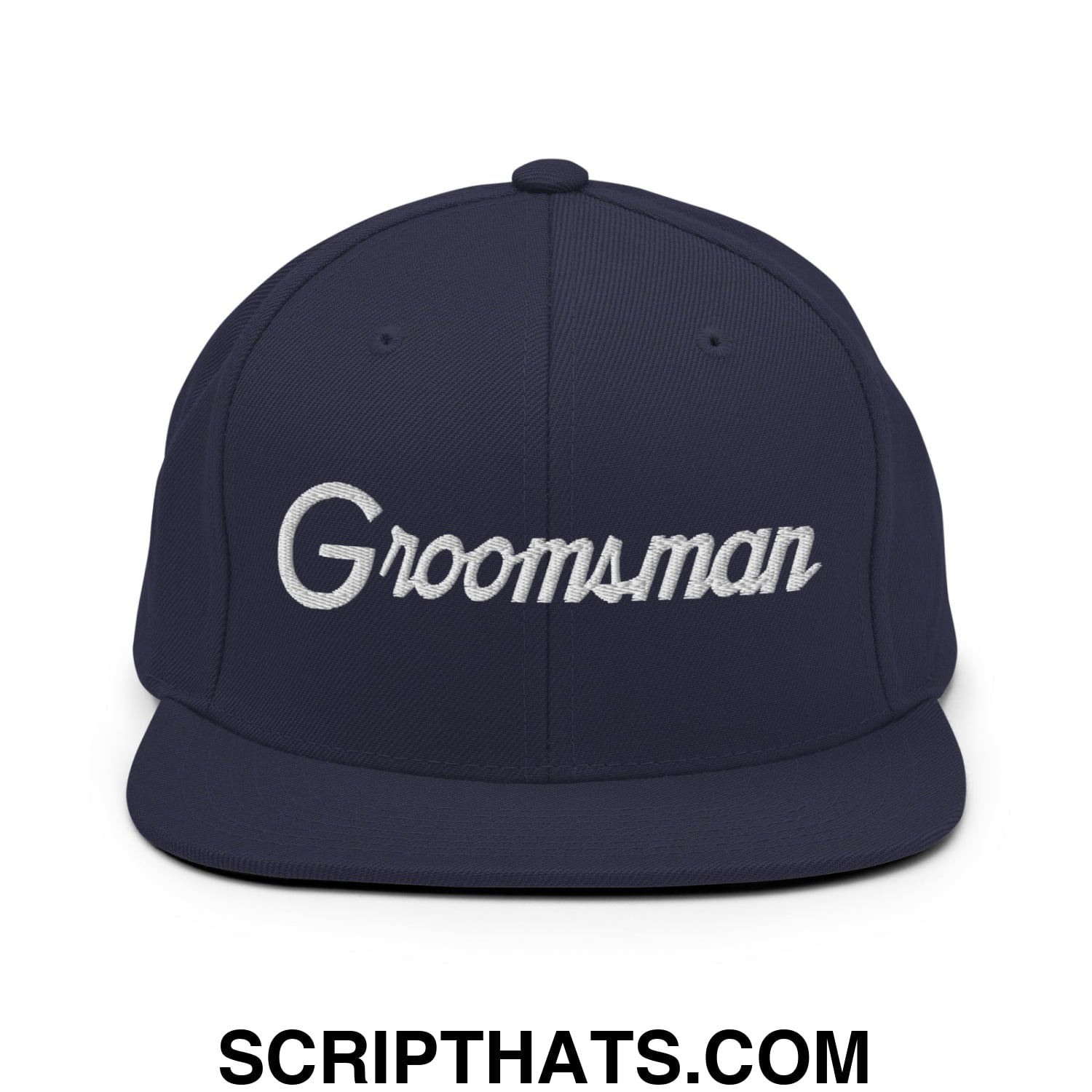 Navy blue snapback hat with white embroidered groomsman script and flat bill brim for wedding use