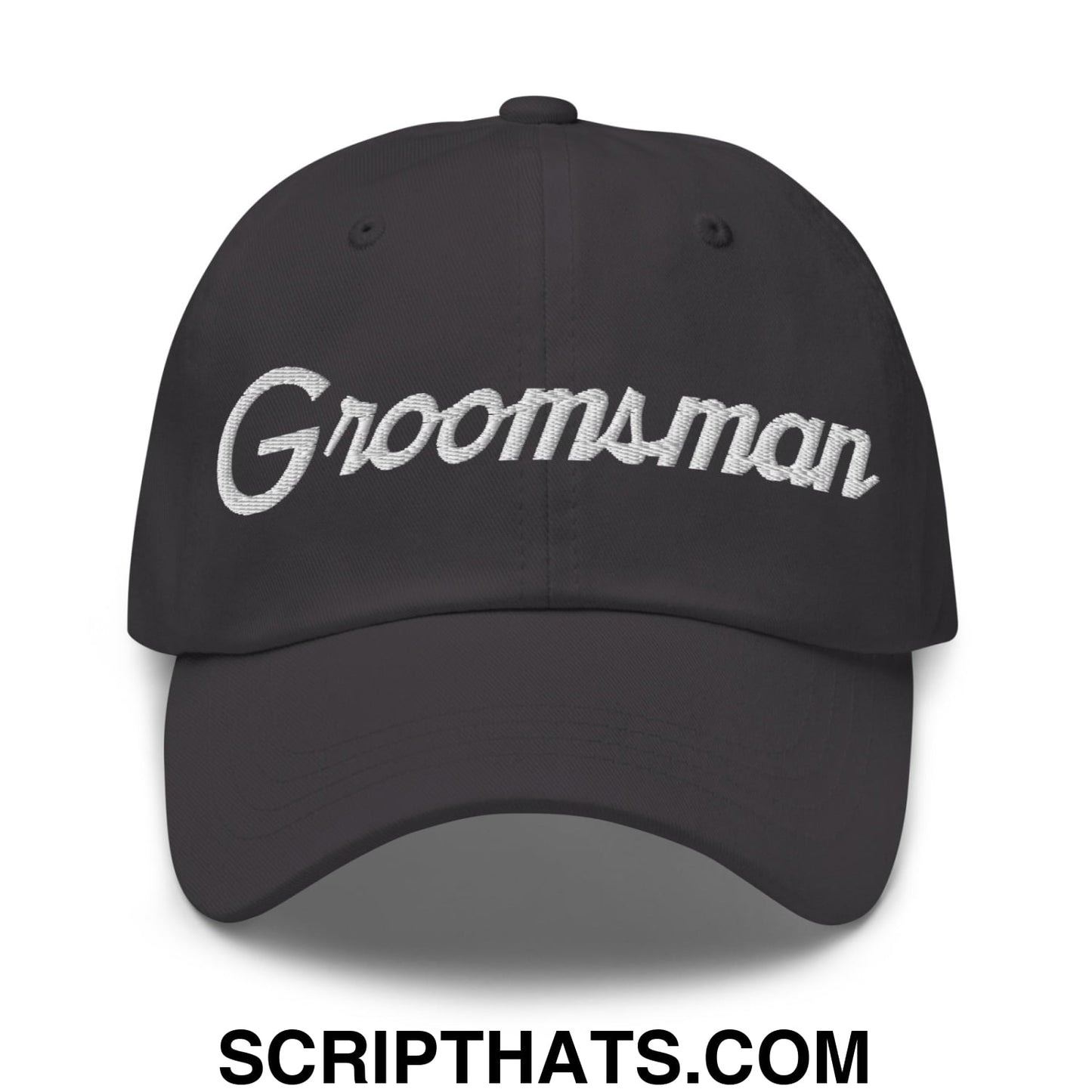 Black unstructured dad hat with white embroidered groomsman sports script across the front for weddings