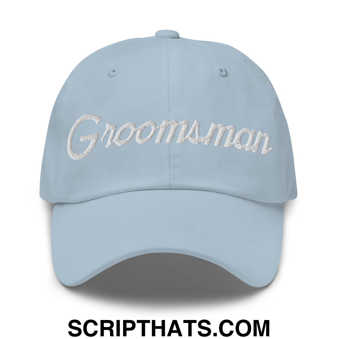 Light blue unstructured dad hat with groomsman embroidered in silver thread sports script design