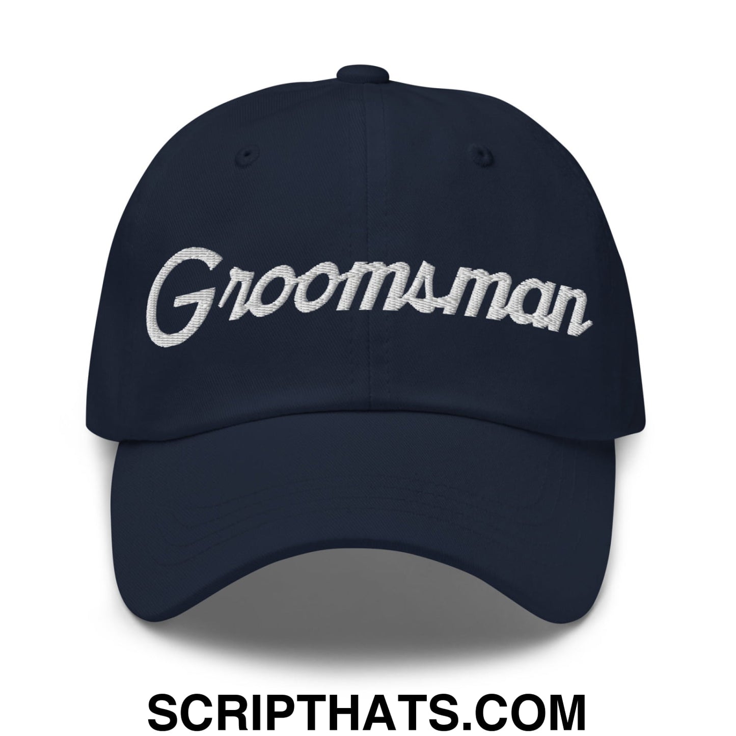 Navy blue unstructured dad hat with white embroidered groomsman sports script on the front panel