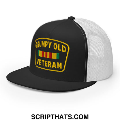 Black and white mesh trucker hat with flat bill and yellow embroidered grumpy old veteran patch above colorful ribbons