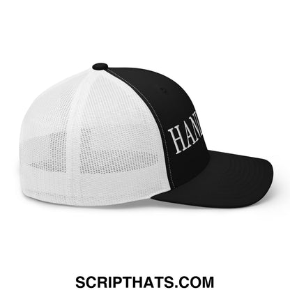 Black and white mesh trucker hat with han embroidered in silver script on front panel hands off design