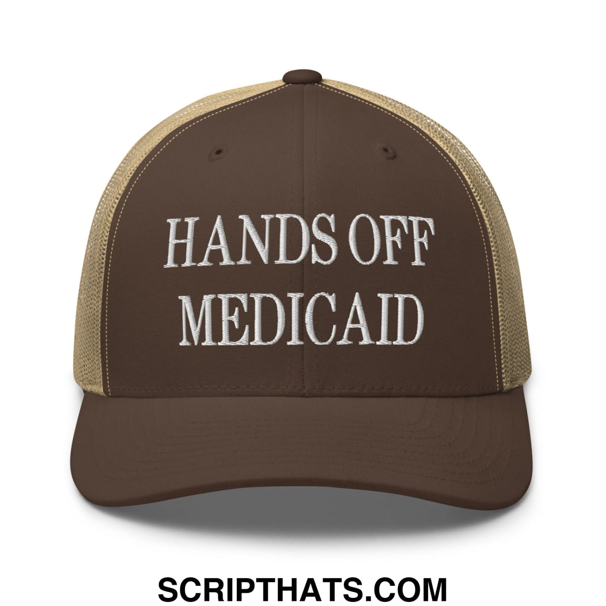 Brown and tan mesh trucker hat with white embroidered hands off medicaid text in a hands off medicaid design