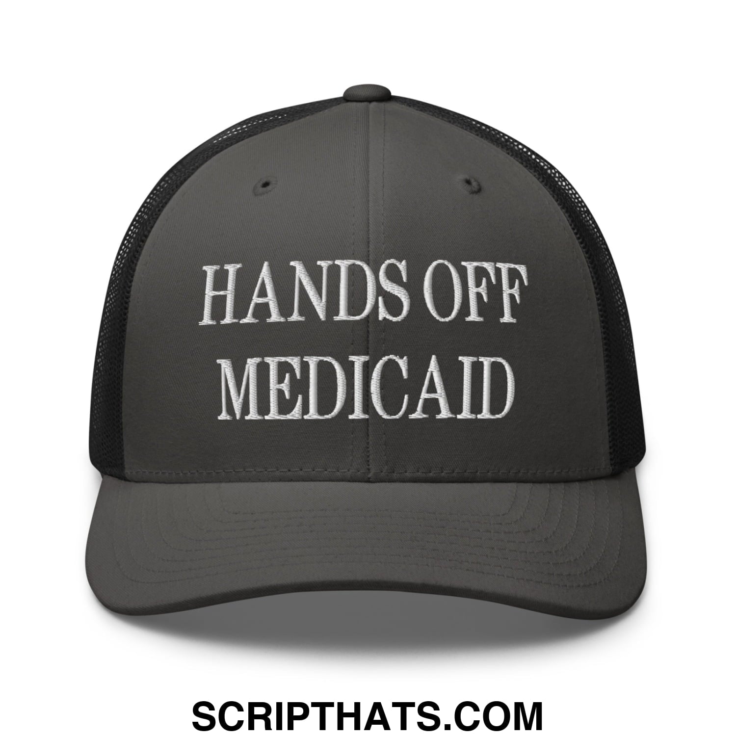 Dark gray mesh trucker hat with white embroidered hands off medicaid text across the front panel