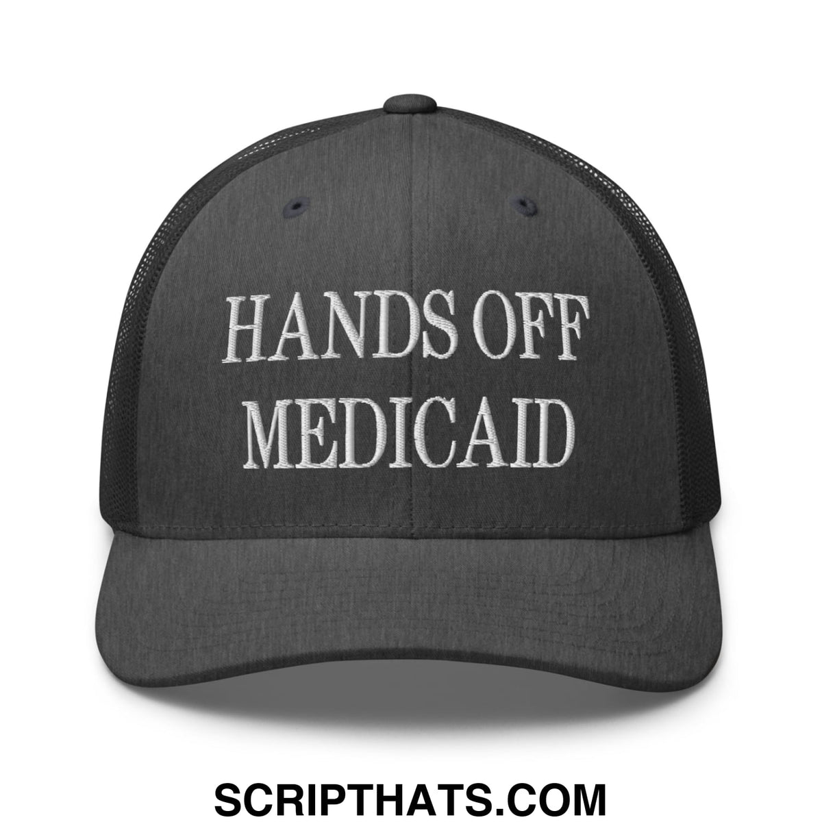 Black mesh trucker hat with white embroidered hands off medicaid text across the front panel