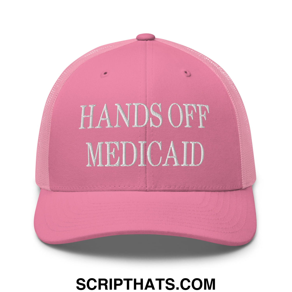 Pink mesh trucker hat with white embroidered hands off medicaid text for advocacy and casual wear
