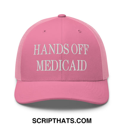 Pink mesh trucker hat with white embroidered hands off medicaid text for advocacy and casual wear