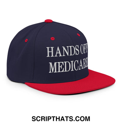 Navy blue and red snapback cap with white embroidered hands off medicare text flat bill brim hat