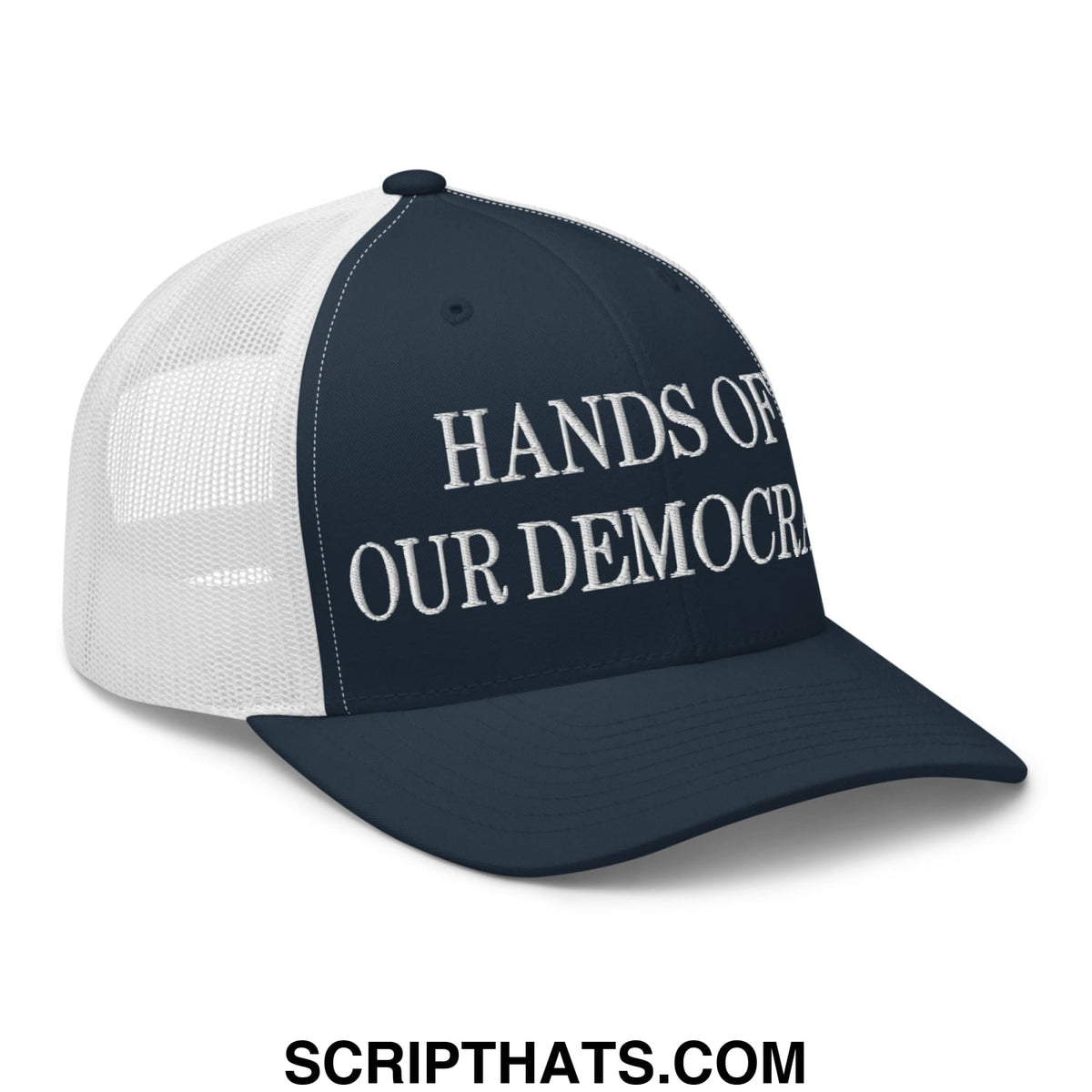Navy blue and white mesh trucker hat with embroidered hands of our democracy text in classic serif font