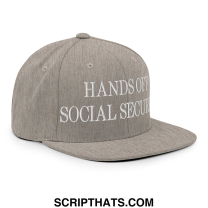 Gray snapback hat with white embroidered hands off social security text and flat bill brim design