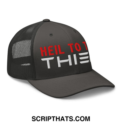 Black mesh trucker hat with red and white embroidered heil to the text on front panel